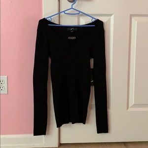 black long sleeved shirt with chain detailing